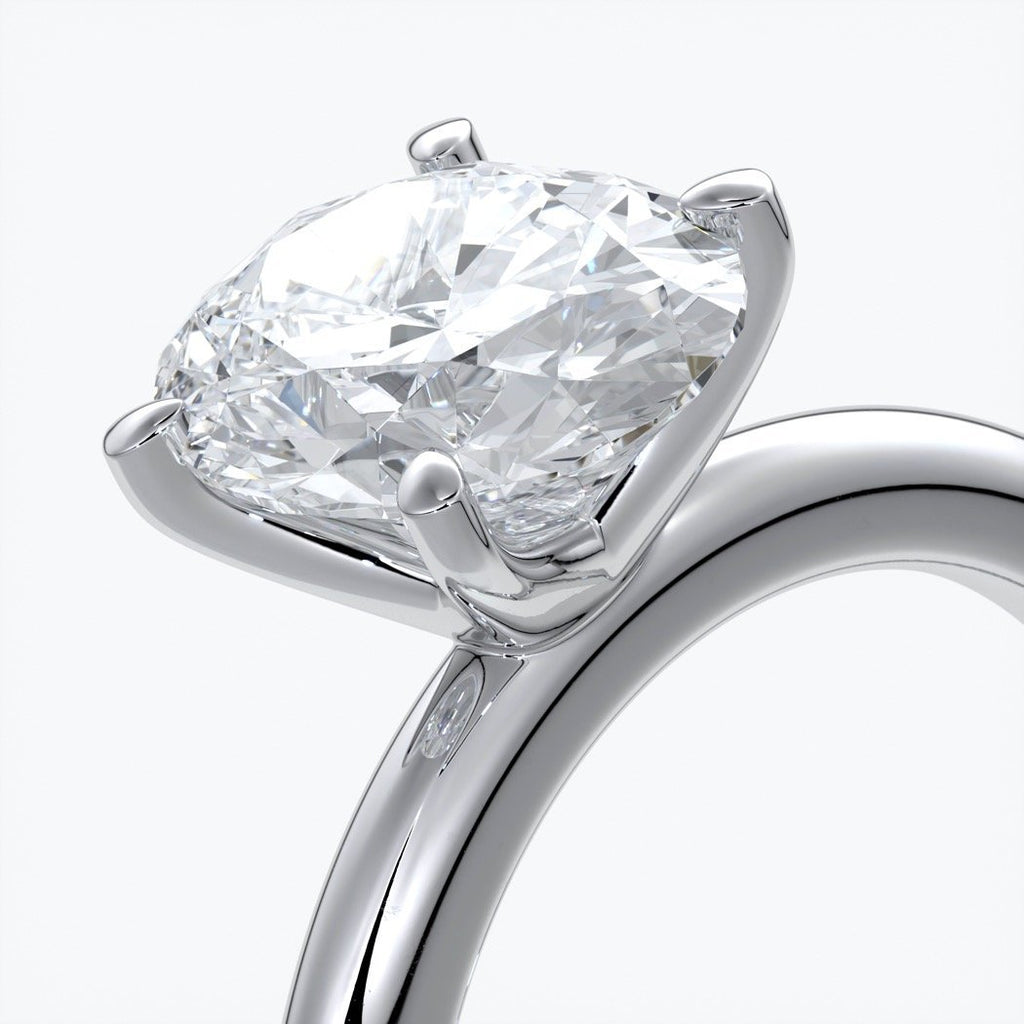 Cleo Engagement ring oval diamond 4 claw 18ct white gold