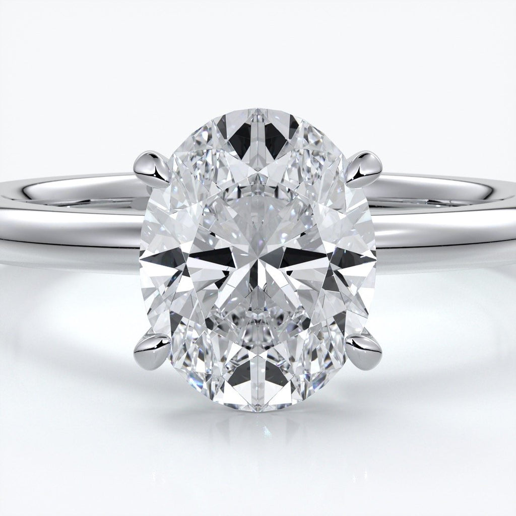 Cleo Engagement ring oval diamond 4 claw 18ct white gold