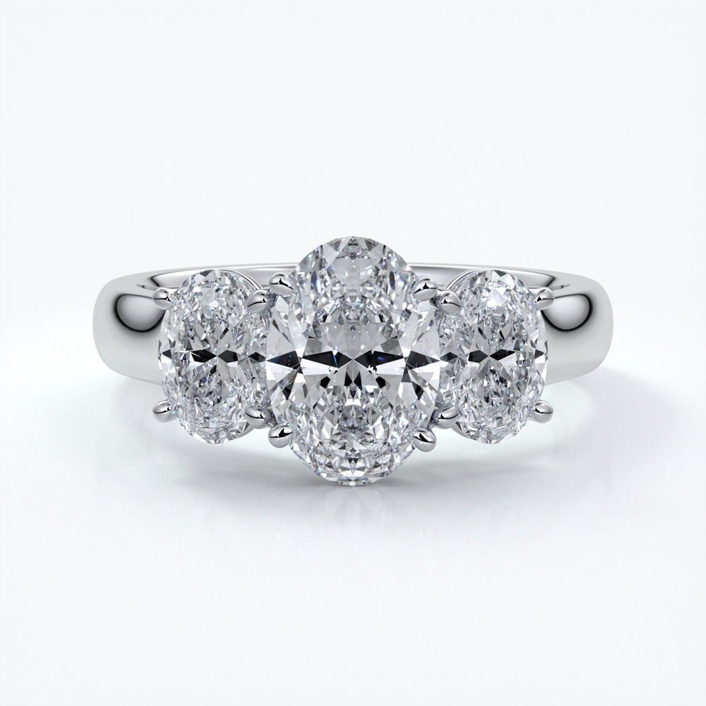 Lucida Engagement ring oval trilogy 4 claw cathedral 18ct white gold