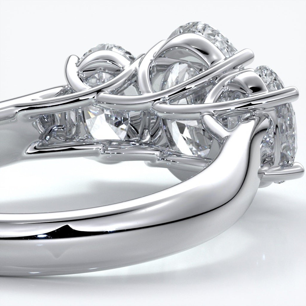 Lucida Engagement ring oval trilogy 4 claw cathedral 18ct white gold